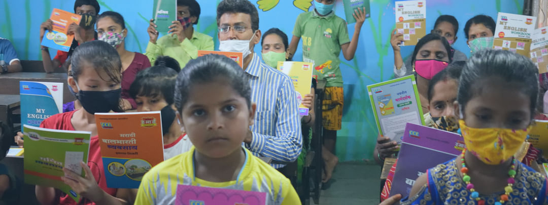 Happy girl at Early Childhood Education Project by Pledge Foundation