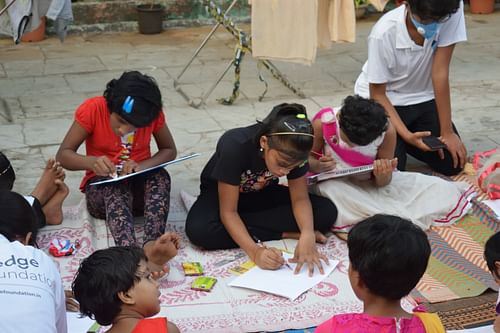 Children drawing at Early Child Education Project