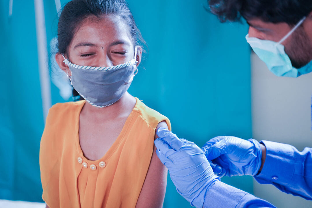 Girl getting vaccination