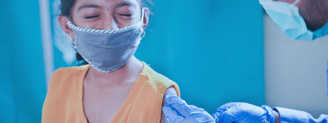 Girl getting vaccination