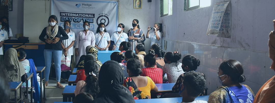 Volunteer educating about menstrual hygiene on international women's day